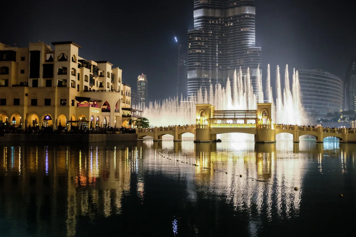 Dubai waterfront and fountain at night